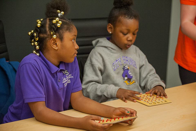 Living Classrooms students focused on Bingo