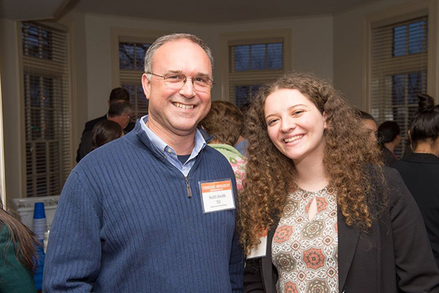 Keith Smith '83 poses with an Immersion Week student
