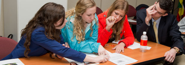 Students collaborating at a table